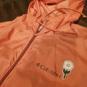 Columbia Kids Orange Raincoat with Floral Patch